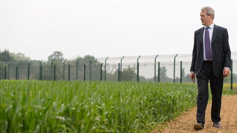 Owen Paterson inspecting a genetically-modified crop trial