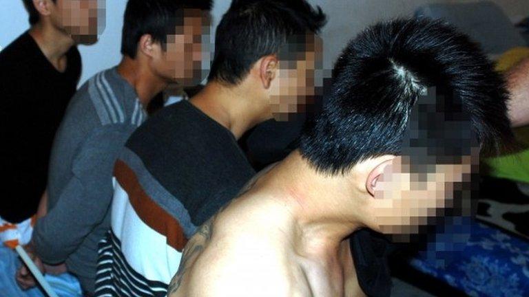 Suspected members of a gang allegedly smuggling (trafficking) Chinese migrants into Europe and the United States