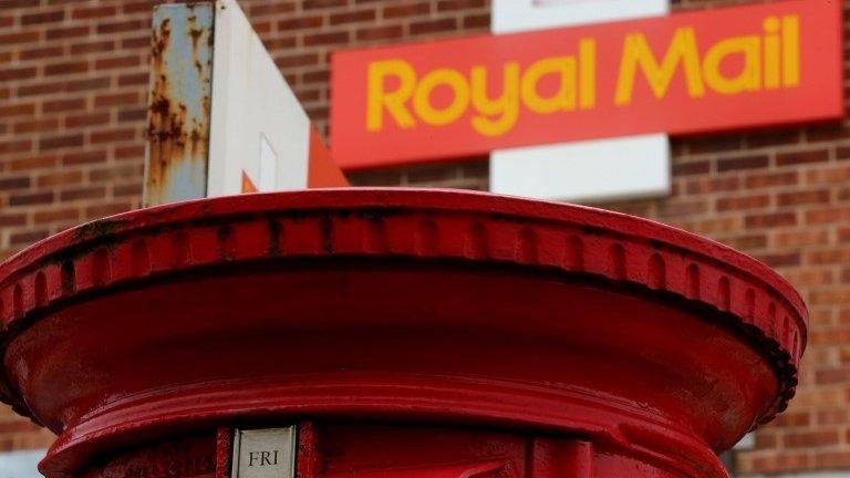 Post box outside a Royal Mail building