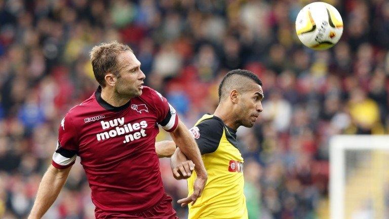 Derby's John Eustace and Watford's Lewis McGugan