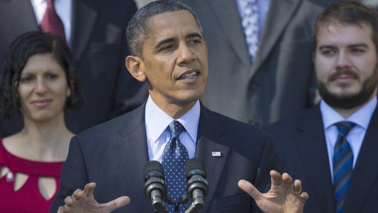 President Barack Obama gestures while speaking in the Rose Garden of the White House in Washington on 21 October 2013