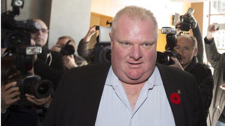 Toronto Mayor Rob Ford arrives to talk on his weekly radio show in Toronto 3 November 2013