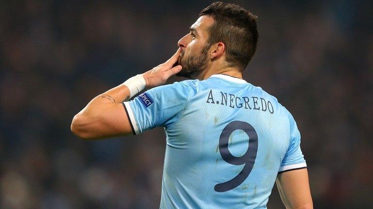 Alvaro Negredo celebrates his hat-trick for Manchester City