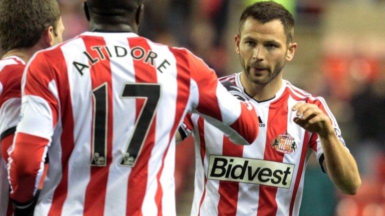 Sunderland's English-born Scottish defender Phil Bardsley (R) celebrates scoring the opening goal