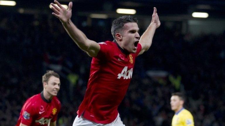 Manchester United striker Robin van Persie celebrates after scoring