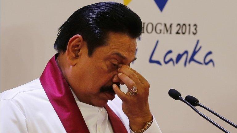 Sri Lankan President Mahinda Rajapaksa reacts during a media briefing a day ahead of the Commonwealth Heads of Governments Meeting in Colombo, Sri Lanka, Thursday, Nov. 14, 2013