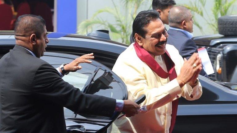 Sri Lankan President Mahinda Rajapaksa arrives for the final day of the summit in Colombo, 17 November