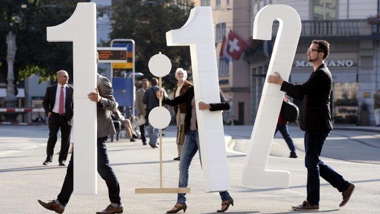 Campaigners in Switzerland pushing for cuts in executive pay in a referendum, 30 August 2013