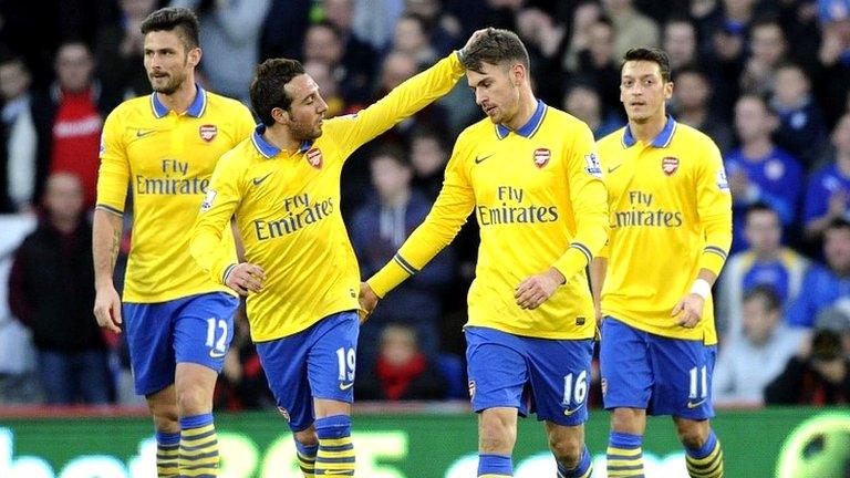 Arsenal celebrate Aaron Ramsey's goal against Cardiff