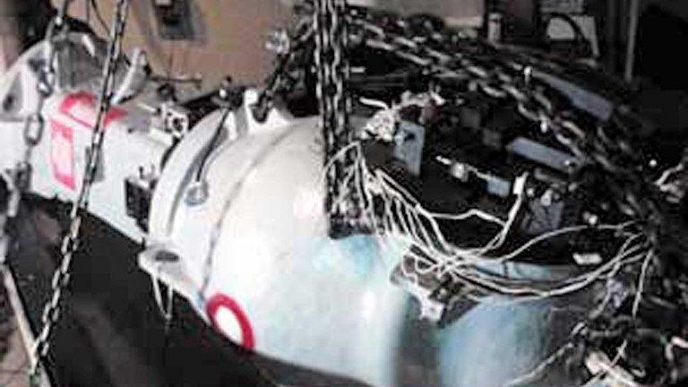 Undated handout picture showing the radioactive equipment being loaded for transport to the truck that was stolen