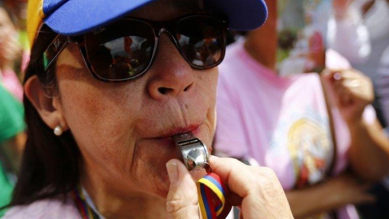 Opposition supporter at rally in Venezuela