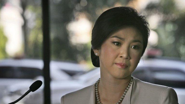 Thailand's Prime Minister Yingluck Shinawatra gets emotional after speaking at a press conference, in Bangkok, Thailand, 10 December 2013