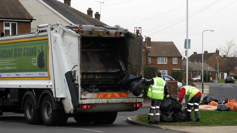 Bin men collecting rubbish