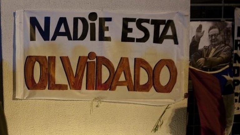 A banner reading "No-one is forgotten" is seen in Santiago de Chile during the 40th anniversary of the 1973 coup