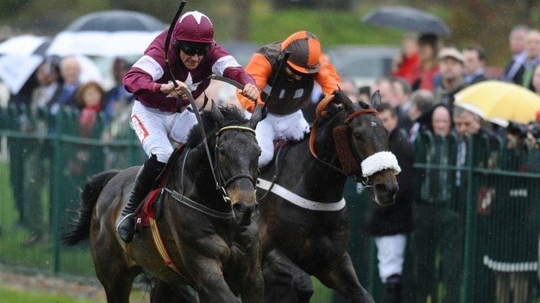 Sir Des Champs beating Long Run at Punchestown