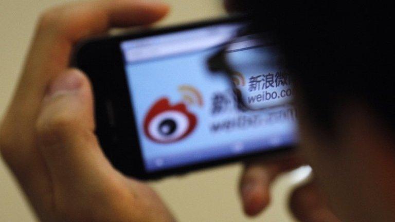 File photo: Man in China checking his microblog account