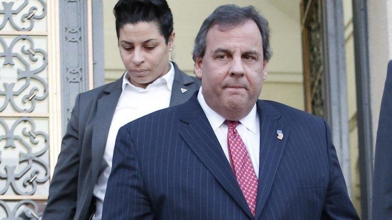 New Jersey Gov. Chris Christie leaves Fort Lee City Hall 9 January 2014