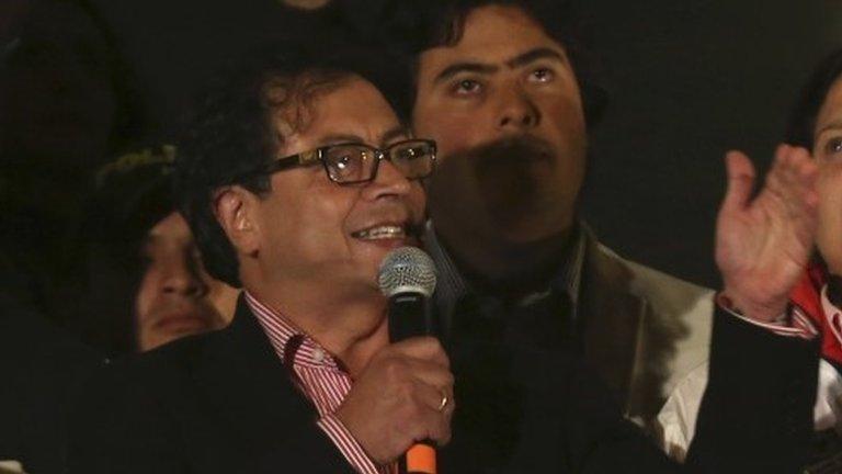 Gustavo Petro (left) delivers a speech at Bolivar Square in Bogota on 13 January, 2014