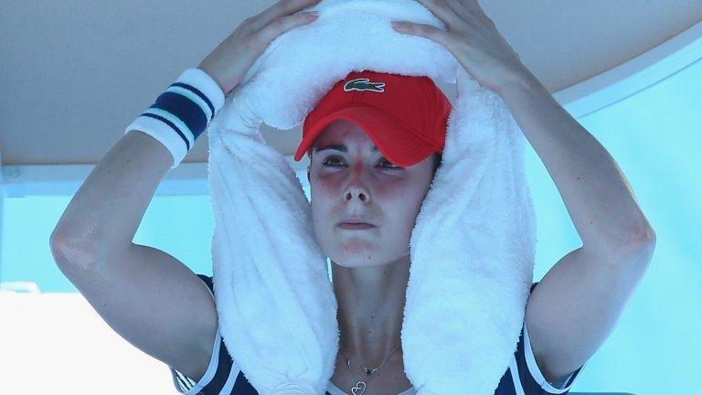 Alize Cornet feels the effects of the heat