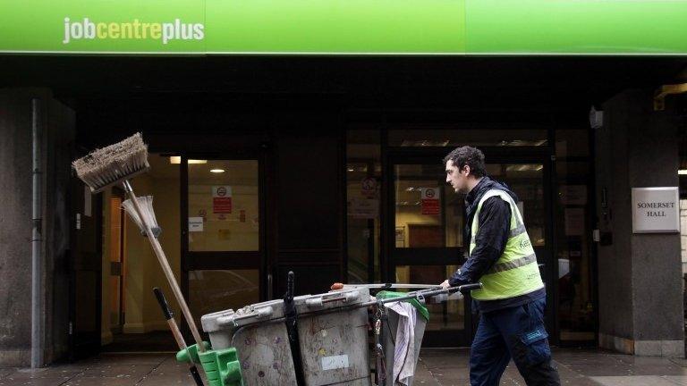 Worker outside job centre