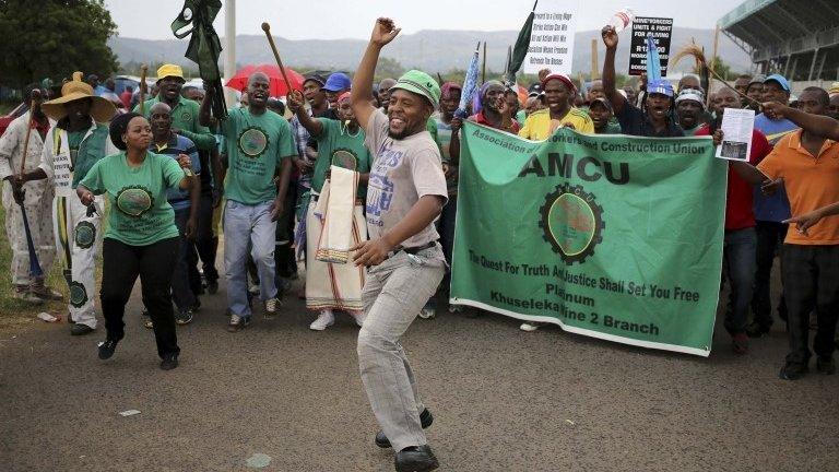 Members of South Africa"s Association of Mineworkers and Construction Union (AMCU) attend a rally in Rustenburg, northwest of Johannesburg January 19, 2014.
