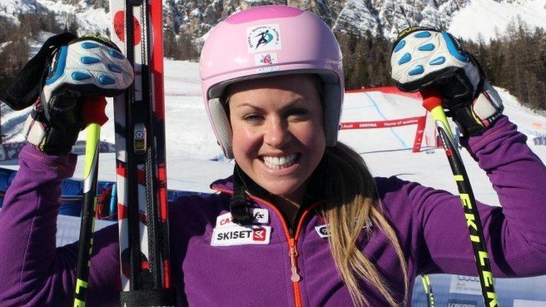 Britain's Chemmy Alcott smiles for a photograph at the finish area after completing an alpine ski, World Cup women's downhill training