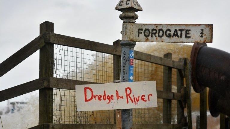 Sign near pumps handling flood water in Somerset