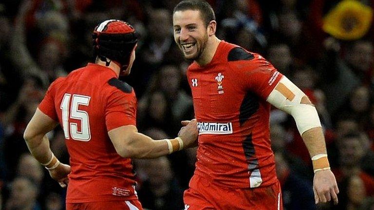 Alex Cuthbert scores the opening try for Wales