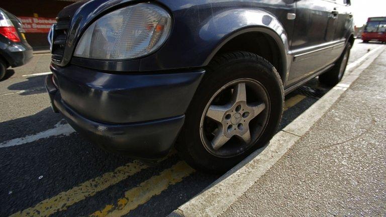 Car on double yellow lines