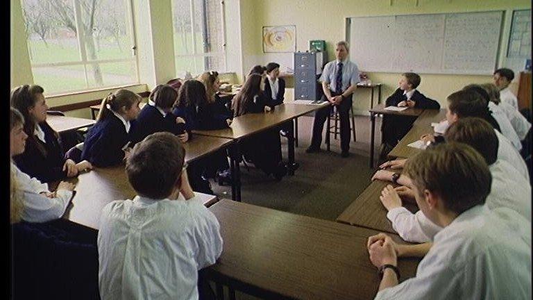 teacher and children in classroom