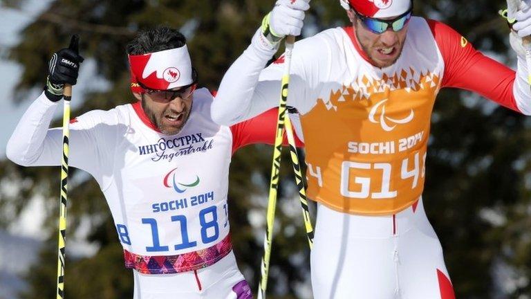 Canada's Brian McKeever is guided by Graham Nishikawa