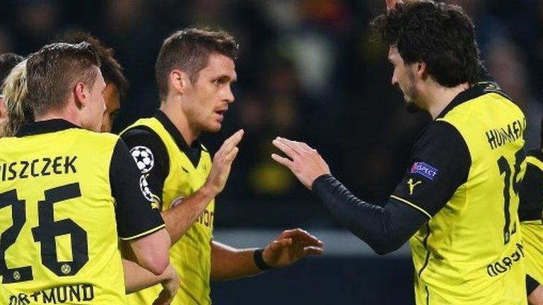 Sebastian Kehl (centre) celebrates with team-mates