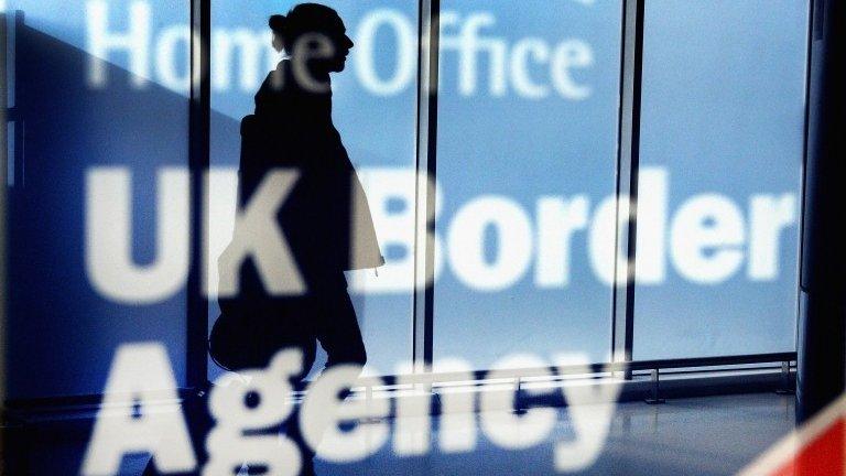 Woman walking through customs