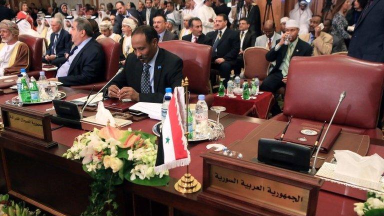 Empty seat for Syrian representative at Arab League summit in Kuwait (25 March 2014)