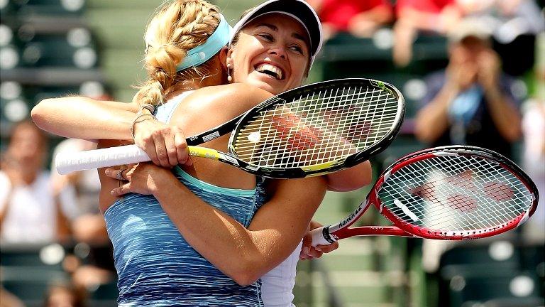 Sabine Lisiki of Germany and Martina Hingis of Switzerland