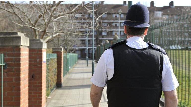 A police officer walking