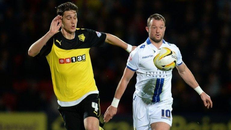 Watford's Gabriele Angella challenges Leeds' Noel Hunt