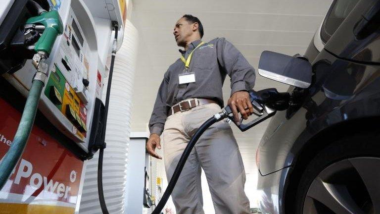 Man filling up car in US