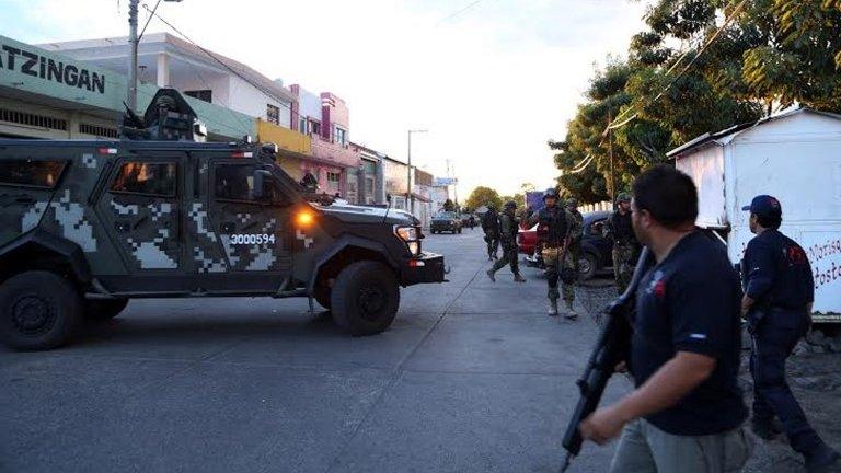 Mexican marines on patrol in Apatzingan on 9 March, 2014