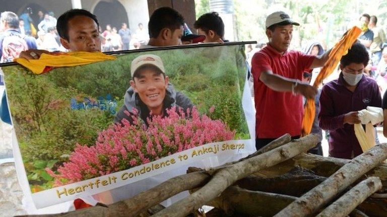 Relatives prepare for the cremation of a Mount Everest avalanche victim in Kathmandu