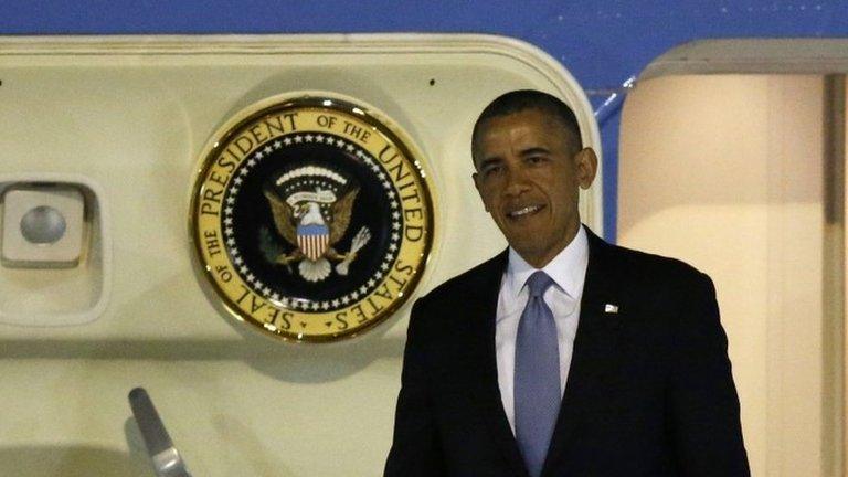 US President Barack Obama steps out from Air Force One as he arrives at Haneda International Airport in Tokyo, 23 April 2014