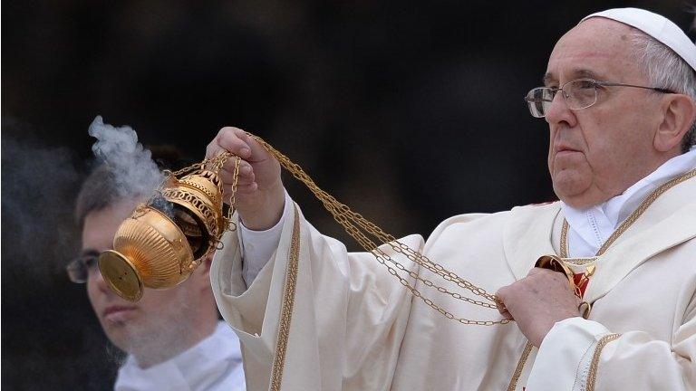 Pope Francis swings the censer during the canonisation mass of Popes John XXIII and John Paul II on St Peter's at the Vatican on April 27