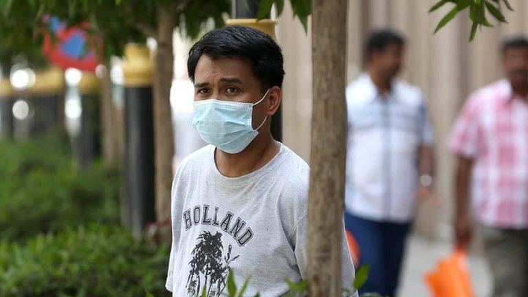 Man wears mouth and nose mask in the Red Sea coastal city of Jeddah. 27 April 2014