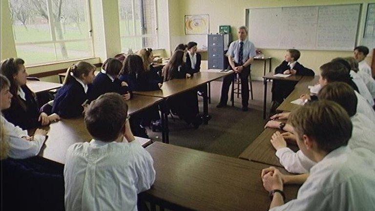 teacher and children in classroom