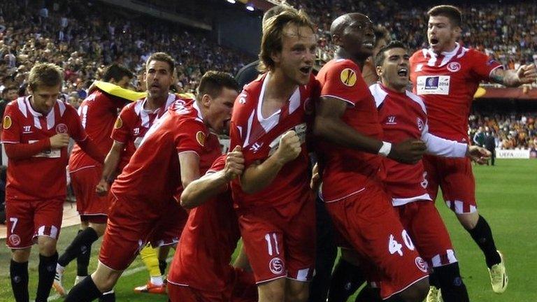 Sevilla celebrate their victory over Valencia on the away goals rule