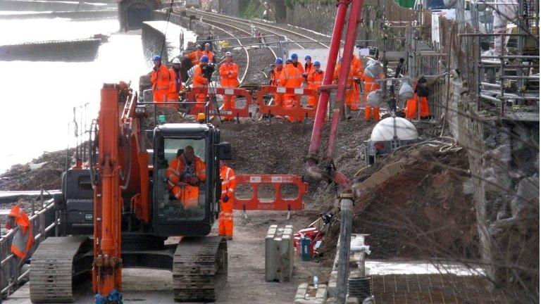 Network Rail workers conducting repairs of the railway line in Dawlish