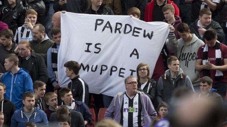 Newcastle fans protest during the match at Stoke on 12 April