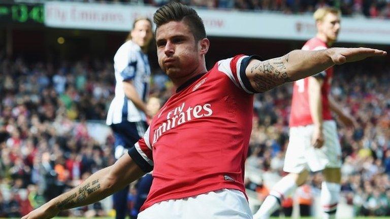 Arsenal striker Olivier Giroud celebrates scoring against West Brom