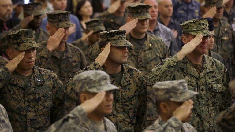 US and Philippine military officers salute during the opening ceremony for the joint military exercise on 5 May in Manila, Philippines