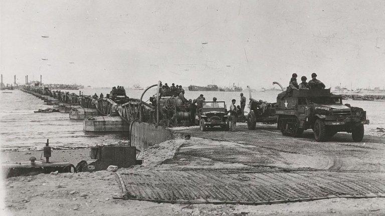 Troops using the Mulberry harbour in 1944